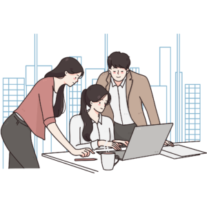事業所内の模擬会社で、スタッフと一緒にパソコン作業を行う利用者の様子