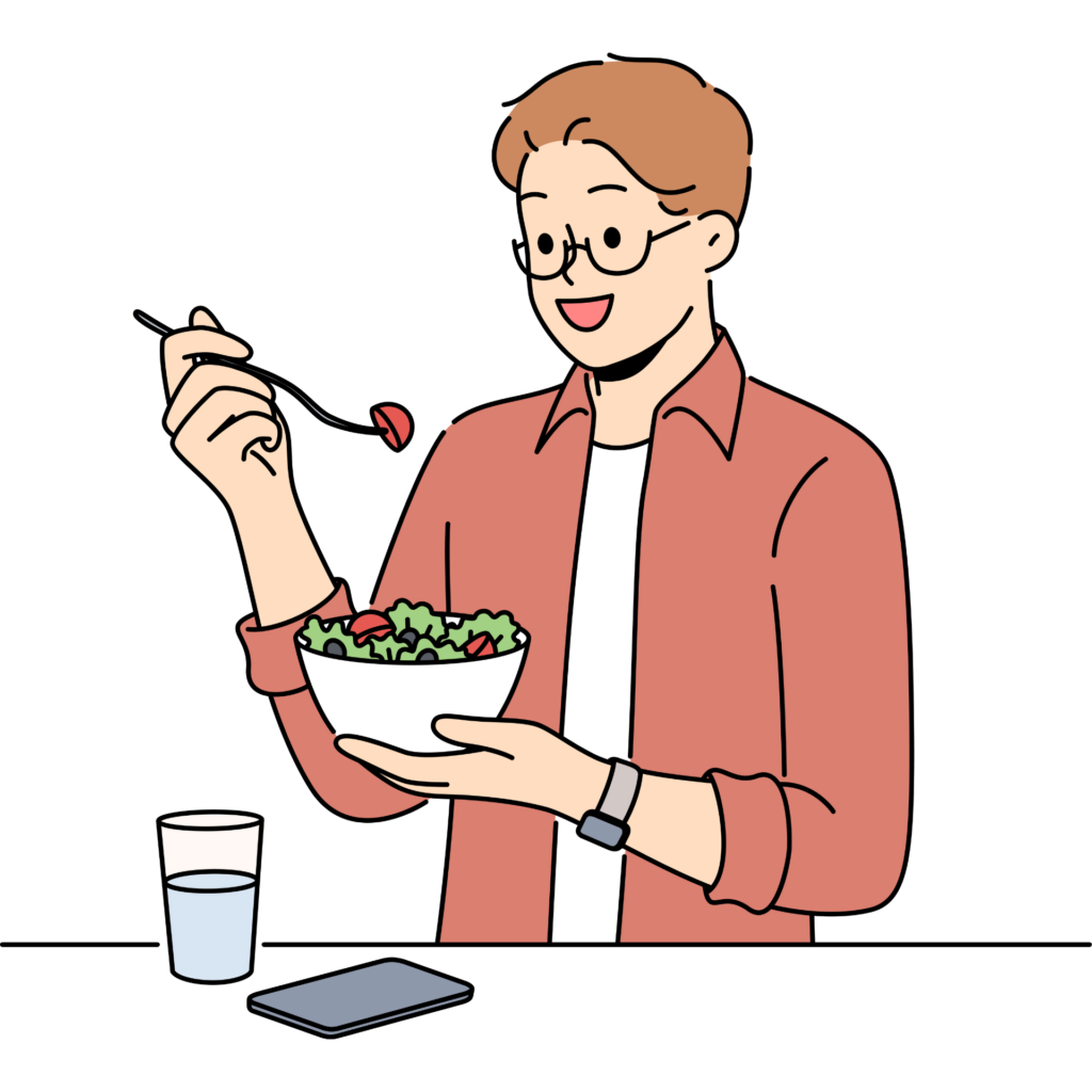 お昼休みにサラダを食べながらリラックスして過ごす利用者の様子